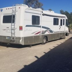 Rv 82,000 miles year 1997 make vacationer model f530f cylinsers 8 heavy duty >=8500.