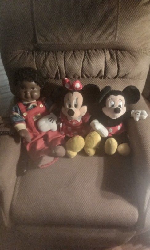 Mickey and minnie stuffed animals and black my buddy