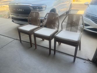 3 woven dining room chairs