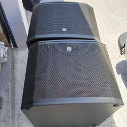 2 1800 Watts Electro Voice Subwoofers. Cover Cables Wheels