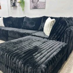 Upgrade Smooth Black Ottoman couch