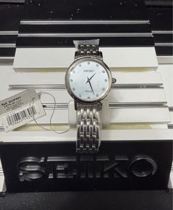 NEW Seiko SUP397 Solar MOP Dial 12 Diamond Stainless Ladies Watch