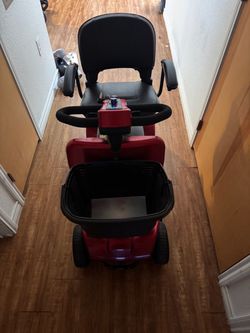 Red Electric Mobility Scooter with Basket
