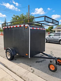 Enclosed Cargo Trailer with Roof Rack