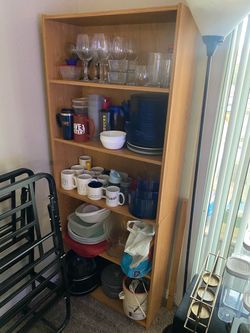 Kitchen ware w/bookcase $100