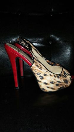 Red leopard pumps