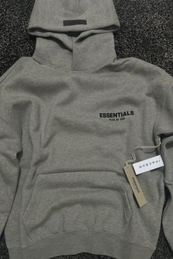Essentials sweater it’s not this one I sold the grey one the one I want to sell is a black medium one it doesn’t have the bag I lost it it’s brand new