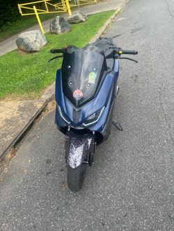 Gas scooter with title