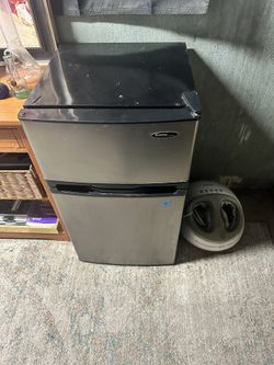 Its a Great Big Mini Fridge About 3feet Tall