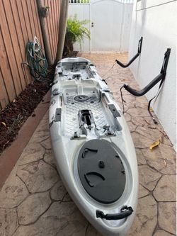 Two person fishing kayak with peddles