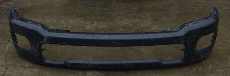 USED REF#M050 || 2019-2024 DODGE RAM 2500/RAM 3500 || FRONT METAL BUMPER COVER ONLY