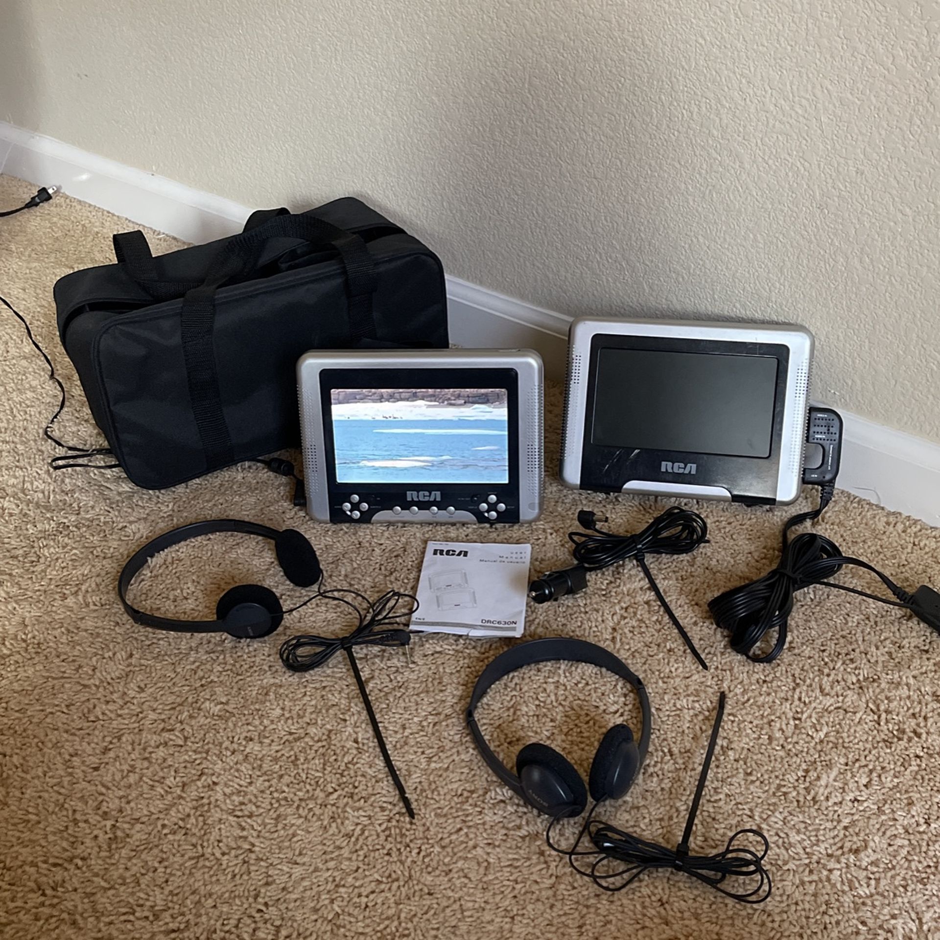 RCA DRC630N DVD Player for Car w/ Car Adapter and 2 Sony headphones