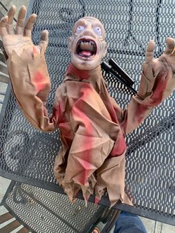 Eye Popping Battery Operated Ground Zombie