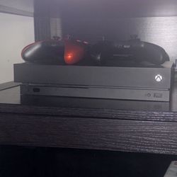 xbox one x 1tb 2 controllers