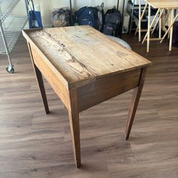 Wooden desk with storage under lid 