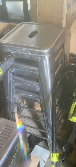 Four metal chairs