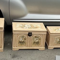 Four Floral Storage Chests