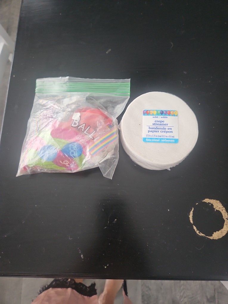 Red Ballons Roll Of White Streams. Party Decorations