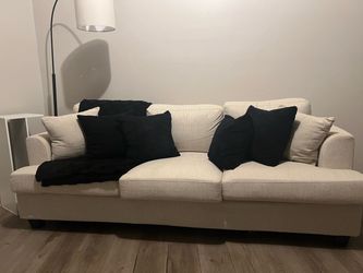 White Couch With Pillows and Blanket Included