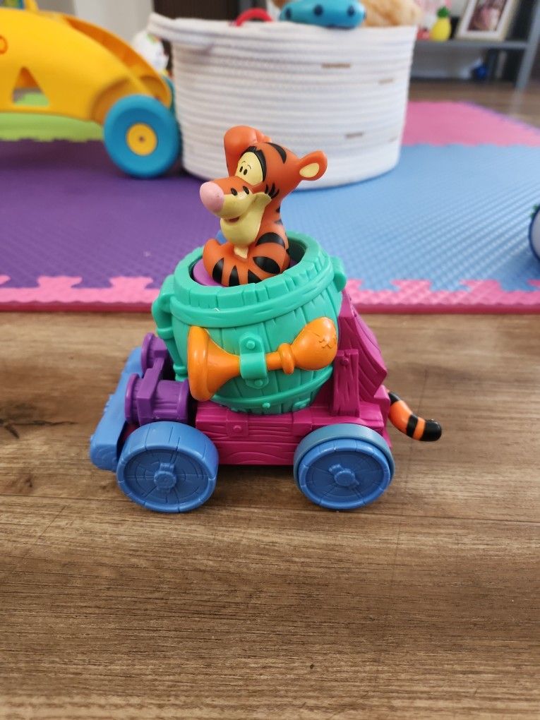 Vintage push Tigger down and go toy car