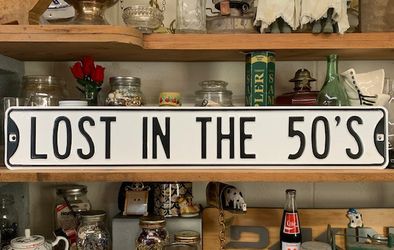 Lost in the 50s. Metal street sign by Andy Rooney