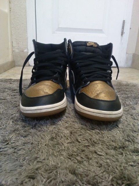 Black And Gold Jordan Ones