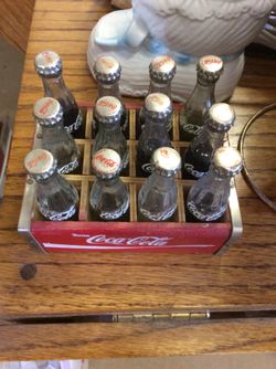 Vintage miniature Coca Cola bottles