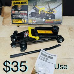 $35 Car Jack 2 Ton Capacity 360 Rotator handle like new use once. With manual instructions