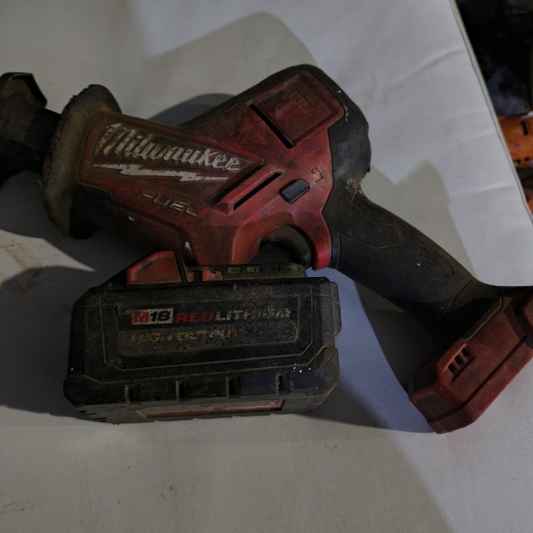Milwaukee Saw Saw Hack Saw And Battery Together