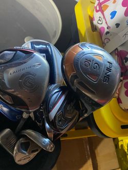 Various golf clubs