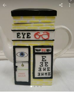 Vintage ceramic canister optometrist shop