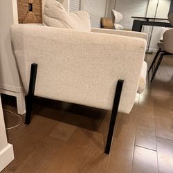 Two IKEA armchairs in a neutral light beige fabric—perfect for living rooms, offices, or reading corners. These chairs are sturdy, comfortable