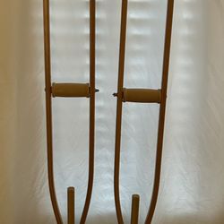 Wooden crutches: Adjustable From 5’ 10” to 6’ 6” tall.