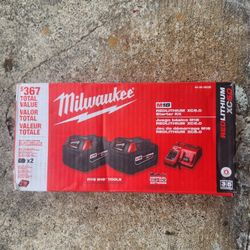 Milwaukee M18 Batteries And Charger 