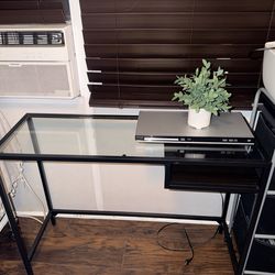 Glass and black metal desk