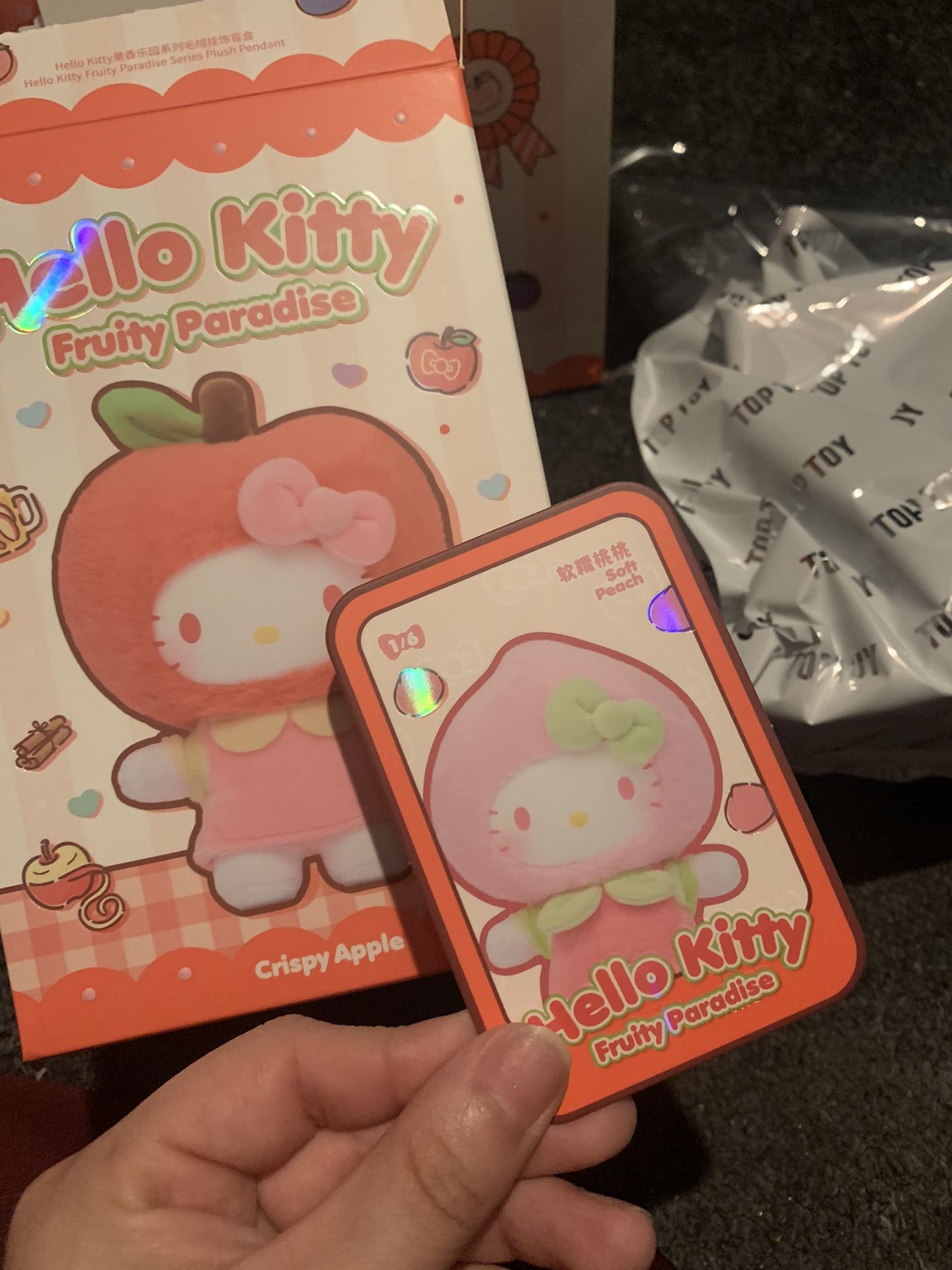 Peach Hello Kitty Plush Pendant