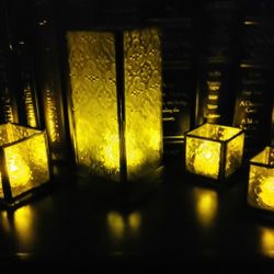 Set of 4: Glass & Metal Candle Holders w/Beautiful Designs pressed into the glass (includes 4 battery operated tea lights)