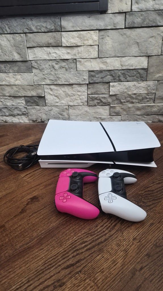 PS5 and 2 Controllers