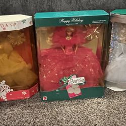 Set of 16 Holiday Barbie Dolls 