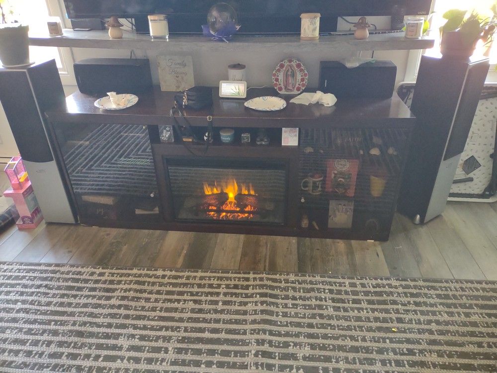 Fire Place Tv Stand With Built-in Heater $500 Value We Are Asking 200 OBO