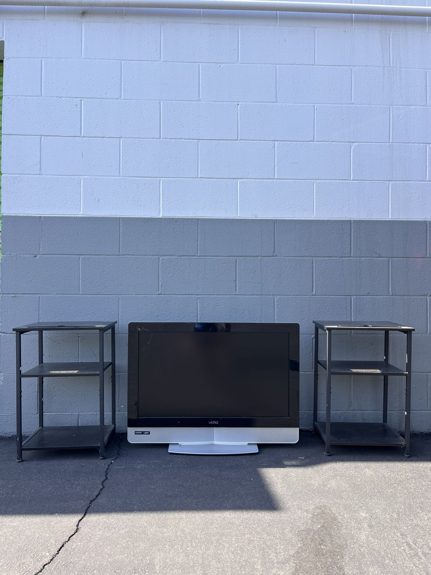 32 Inch Vizio TV And 2 Wooden Night Stands