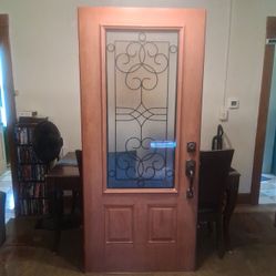 Therma Tru Entrance Door.  Fiberglass With Frosted Glass And Wrought Iron "Salinas Style" Design.  Classic Mahogany Finish.  36"x79.5".