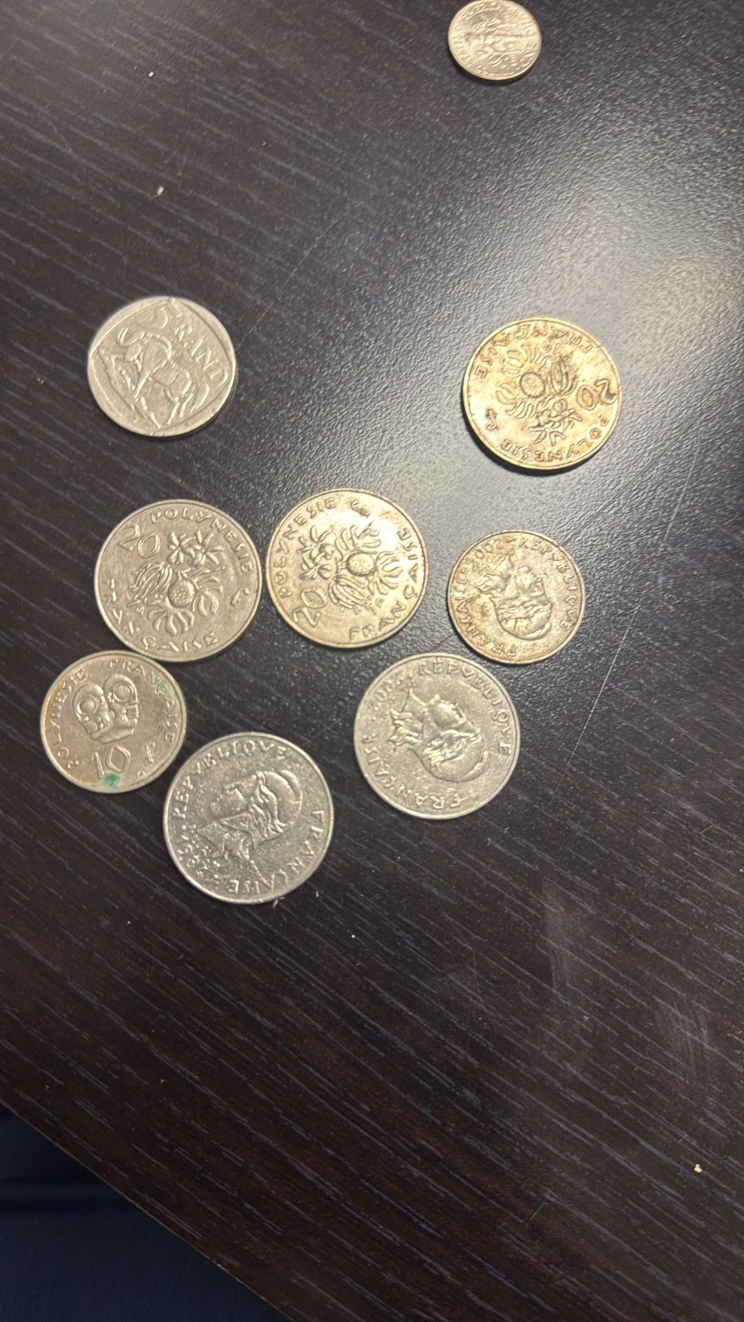 1974 Barbados 8-Piece Proof Set. This set includes eight coins, with two of them being made of silver. Proof coins are specially made early samples t