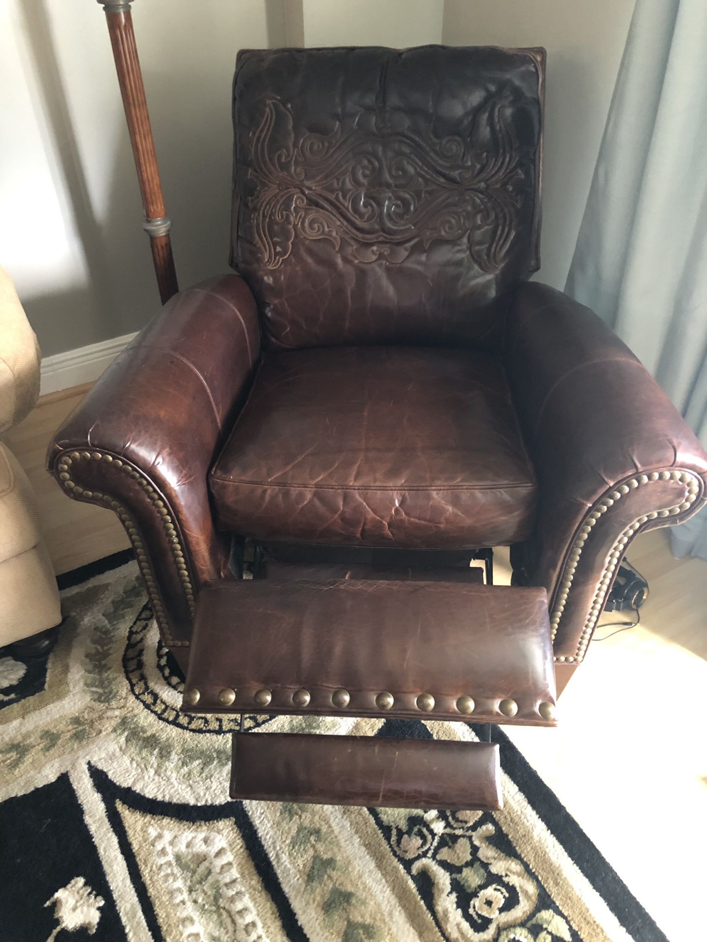 Rich dark detailed leather brown recliner. MUST GO BEST OFFER