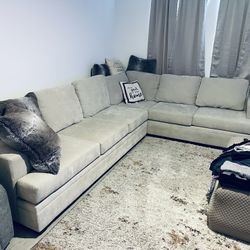 Beige L Shaped Sectional. 