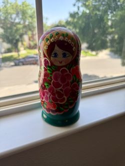 This is a Matryoshka doll, also known as a Russian nesting doll. It is a set of wooden 
