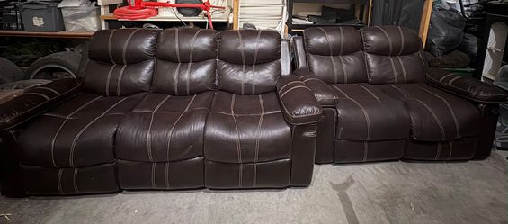 Dark brown leather couches