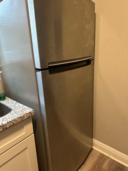 Refrigerator and kitchen stove