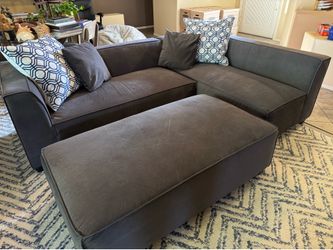 Navy blue sectional sofa & ottoman - comfy!