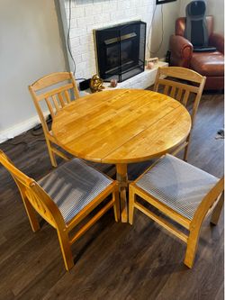 Blonde, wooden table & chairs